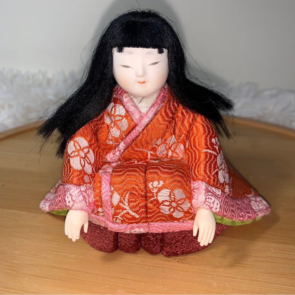 Japanese Tradition Ichimatsu Doll Sitting doll Girl in Orange kimono Japan